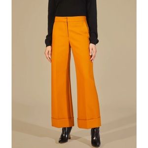 KHAITE Devon Wide Leg High-Rise Trousers in Goldenrod